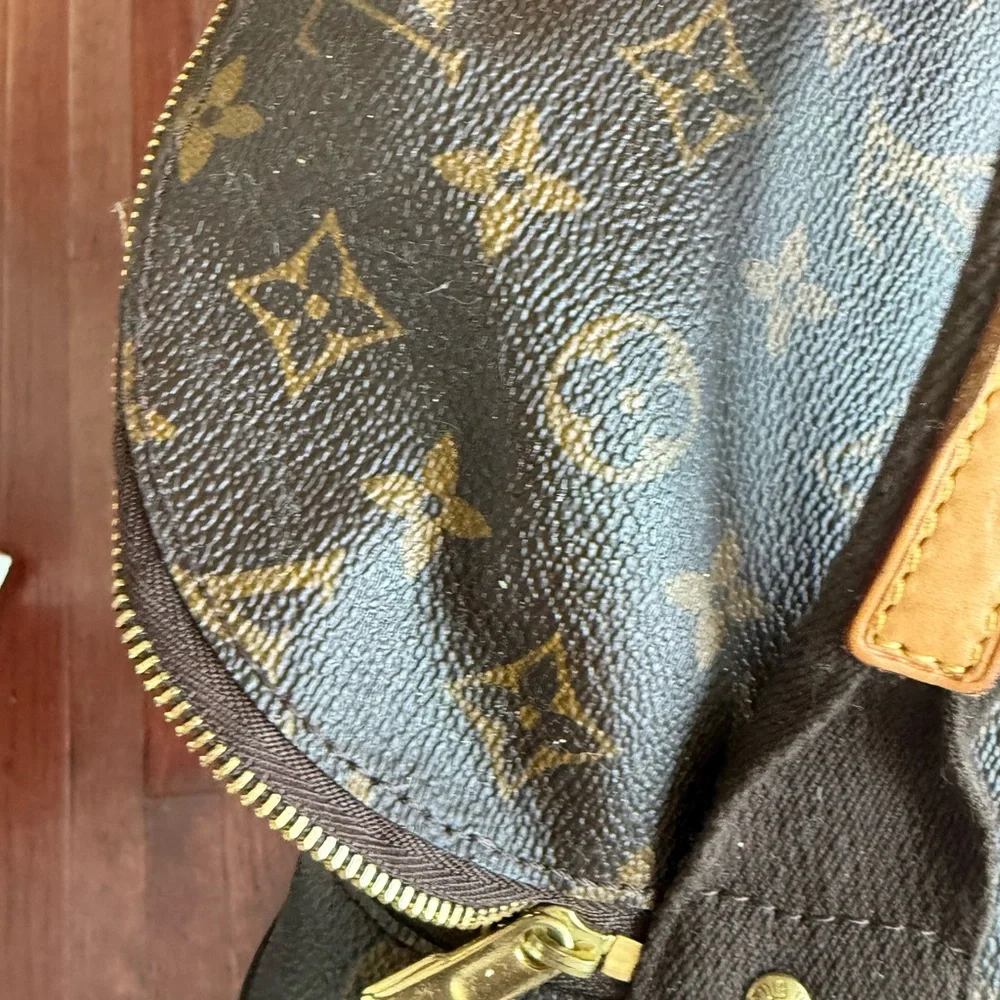 Louis Vuitton Monogram Canvas Rolling Duffel in Brown and Tan